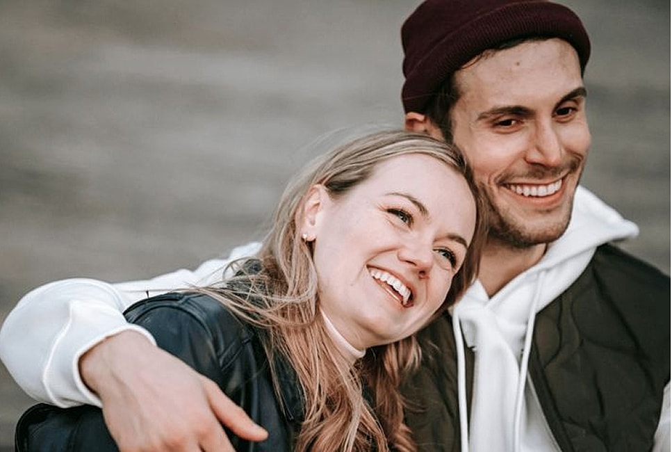 Happy couple enjoying a warm moment together.