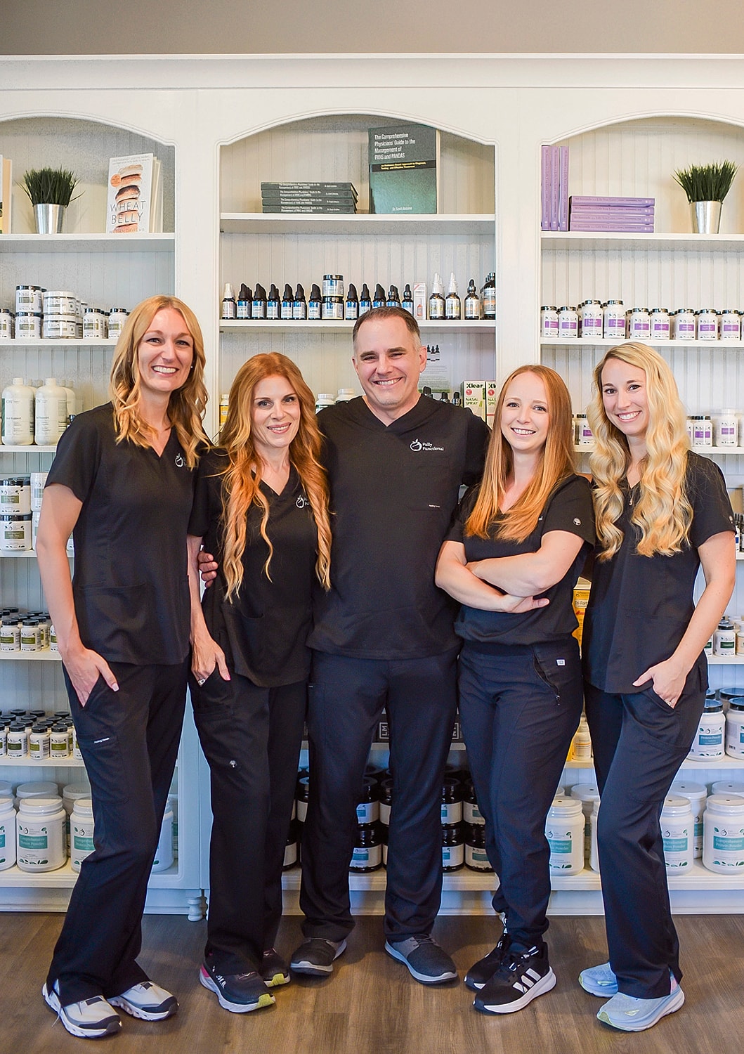 Team of professionals in wellness clinic setting.