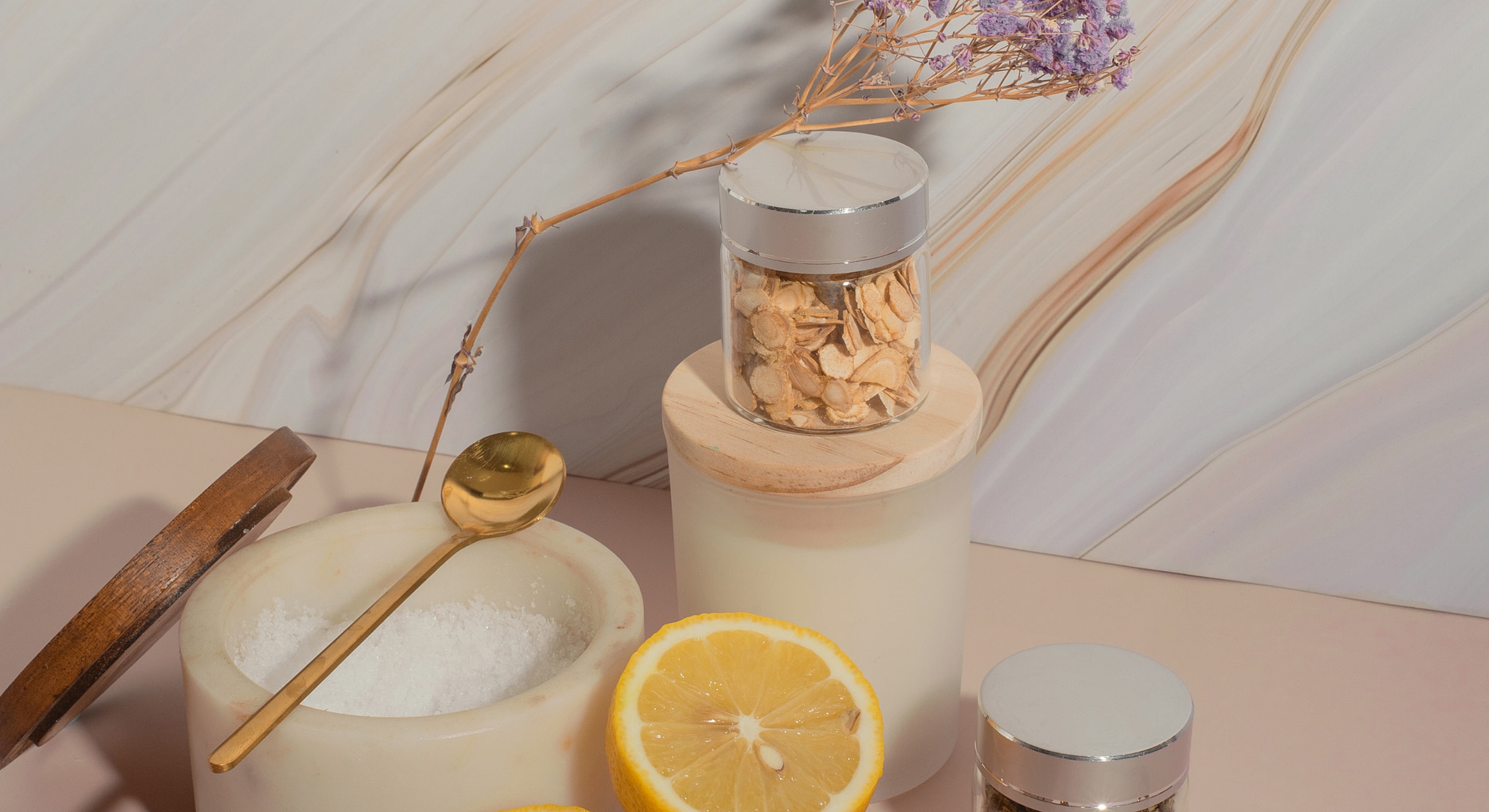 Spa products with fresh lemons and decorative elements.