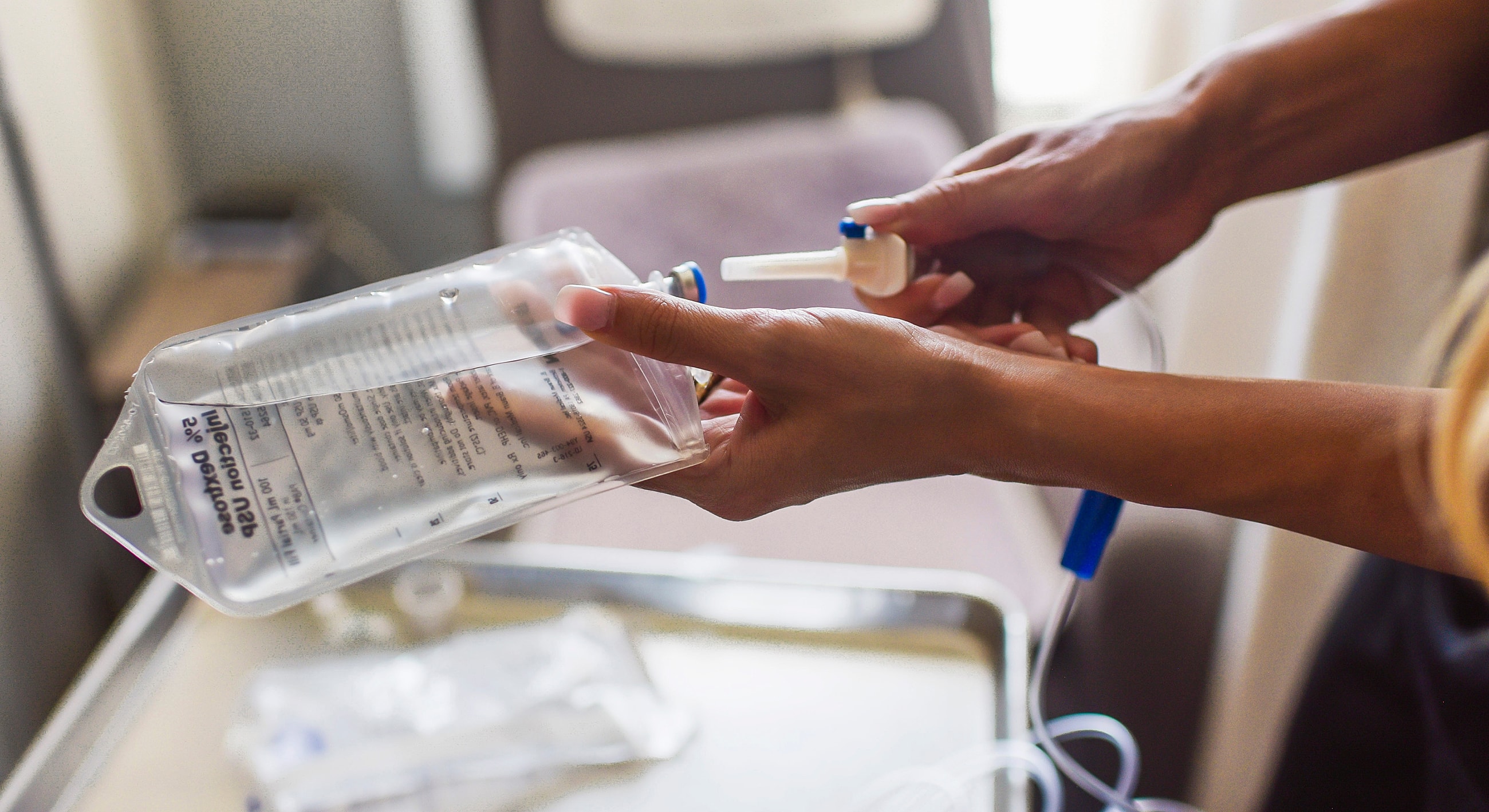 Preparing an IV drip in a clinical setting