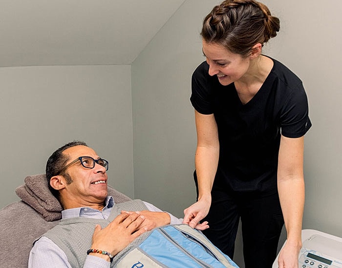Patient receiving care from healthcare professional.
