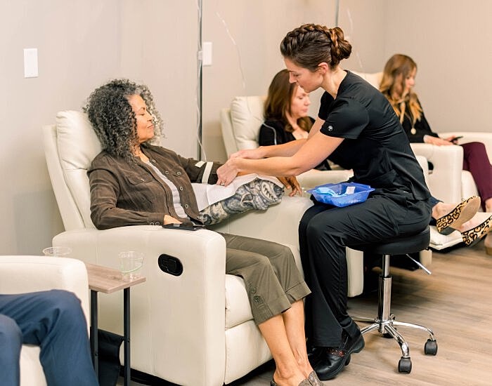 Client receiving treatment at wellness center.