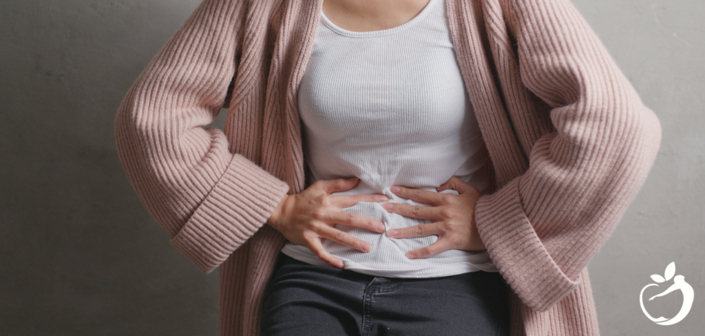 Woman holding her stomach