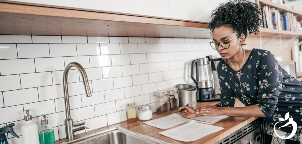 woman looking at tax paperwork