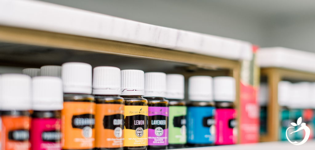 row of essential oils on a shelf