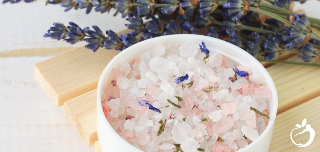 bowl of bath salts with lavender in it