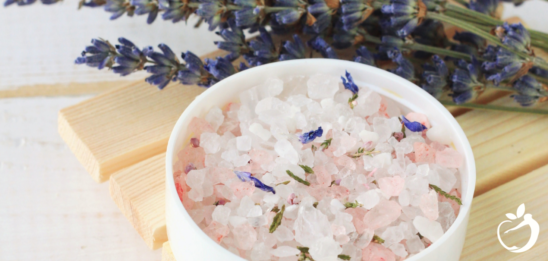 Blog Post Header Image - Magnesium Bath Salts With Lavender Recipe. Image of bath salts with lavender.