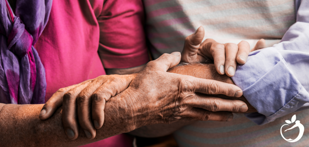 two people holding each others arms