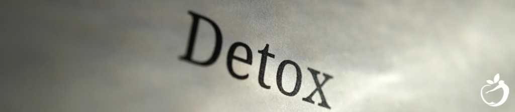 the word 'detox' typed on a piece of paper