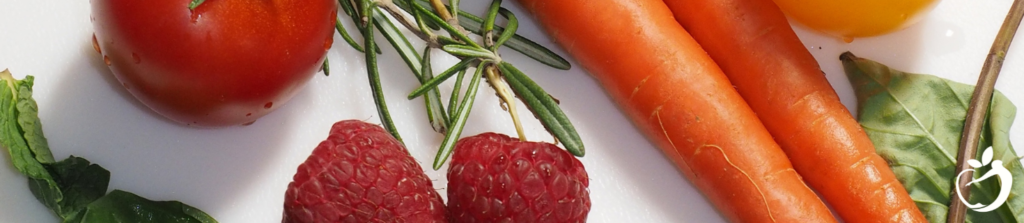 rosemary, mint, carrots, rasperries, and a tomato