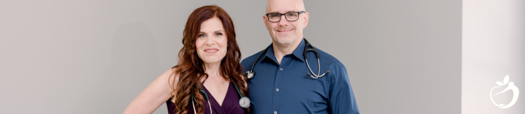 Dr. Scott and Dr. Ellen Antoine standing and smiling