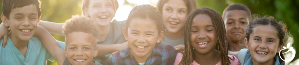 Inline Image 1 - What to do if your Child has Pans/Pandas - Explanation of PANS/PANDAS - image of a group of happy children with arms around each other