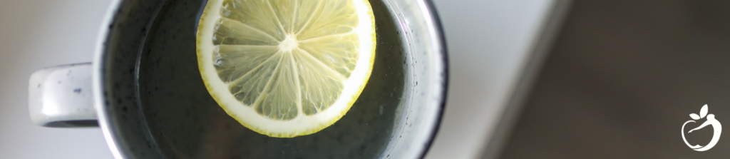 lemon slice in a cup of water