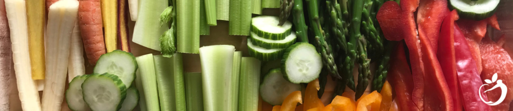 an assorted row of sliced vegetables