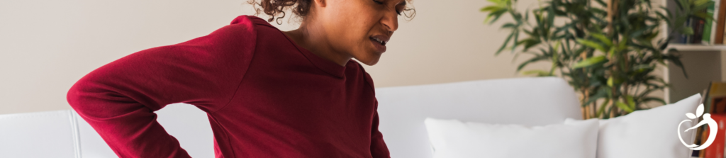 Managing Chronic Pain. Image of a person experiencing severe lower back pain.