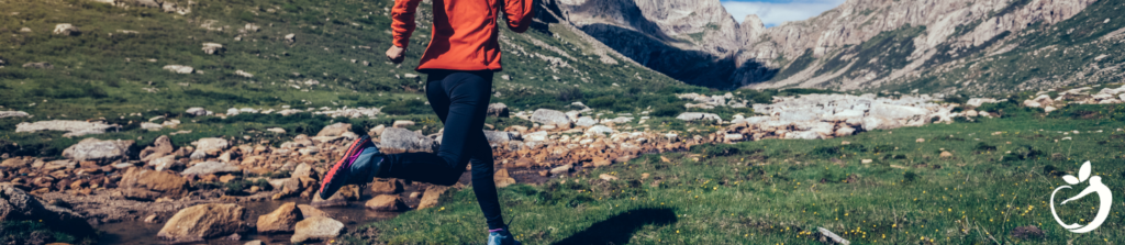 person running through a valley