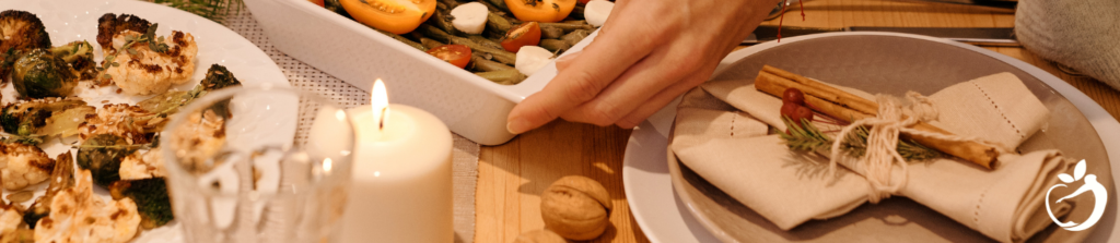 holiday dinner setting on a table with nutritious food in casserole dishes