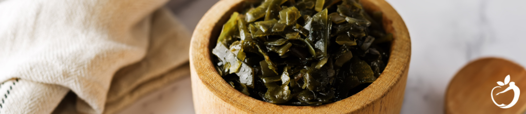 cooked seaweed in a wooden bowl