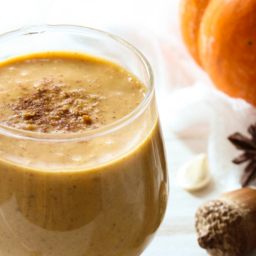 pumpkin smoothie in a wine glass