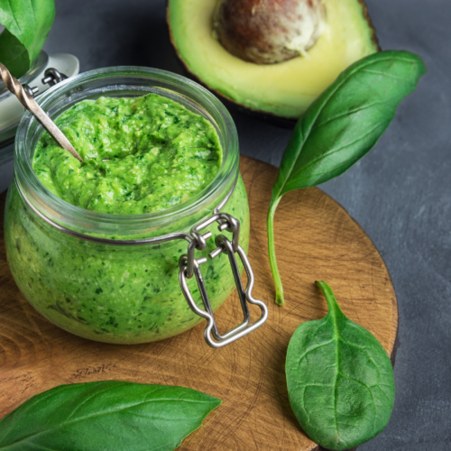 Recipe Post Header Image of Cashew Spread With Avocado in a glass container.