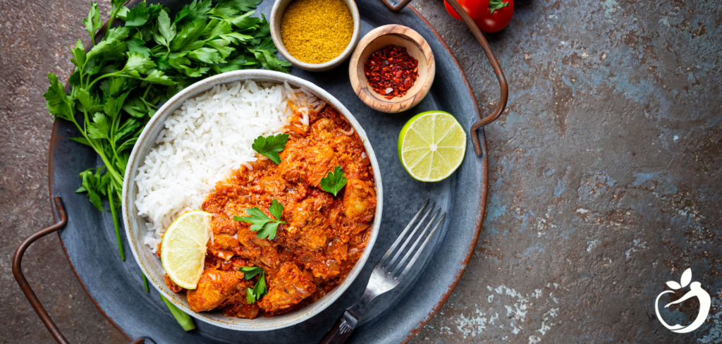 chicken tikka masala with rice and other seasonings