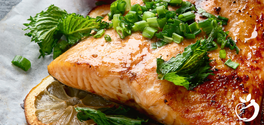 cooked salmon with herbs and lemon
