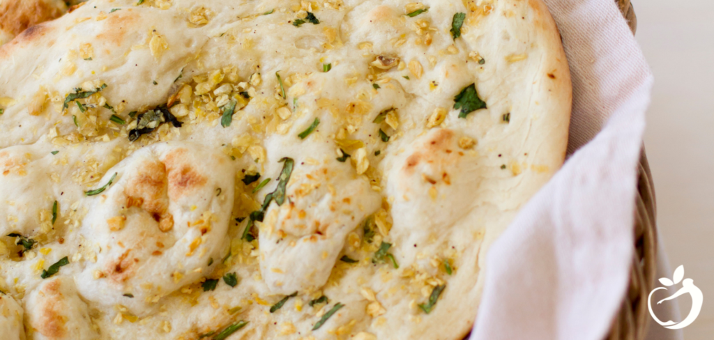 Recipe Post Header Image of Gluten-Free Flatbread Recipe: Garlic and Chive in a bread basket.