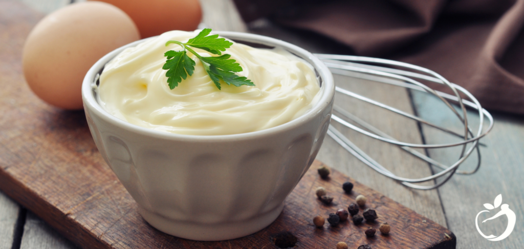 image of paleo mayonnaise in a bowl with garnish