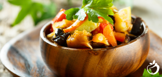 Recipe Post Header Image - Root Vegetable Stew - Crockpot Goodness. Image of stew in a bowl.