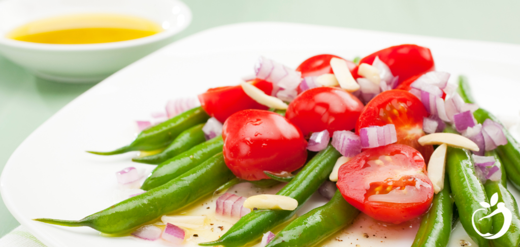 Image of Summer Green Bean and Tomato Salad on a plate.