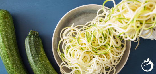 Recipe Post Header Image - Zucchini Noodles With Chicken and Broccoli. Image of zucchini noodles on a plate.